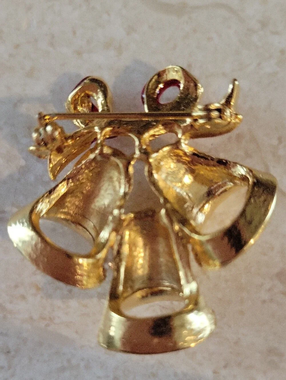 Gold-tone Holiday Bells Brooch with Red Enamel Bow